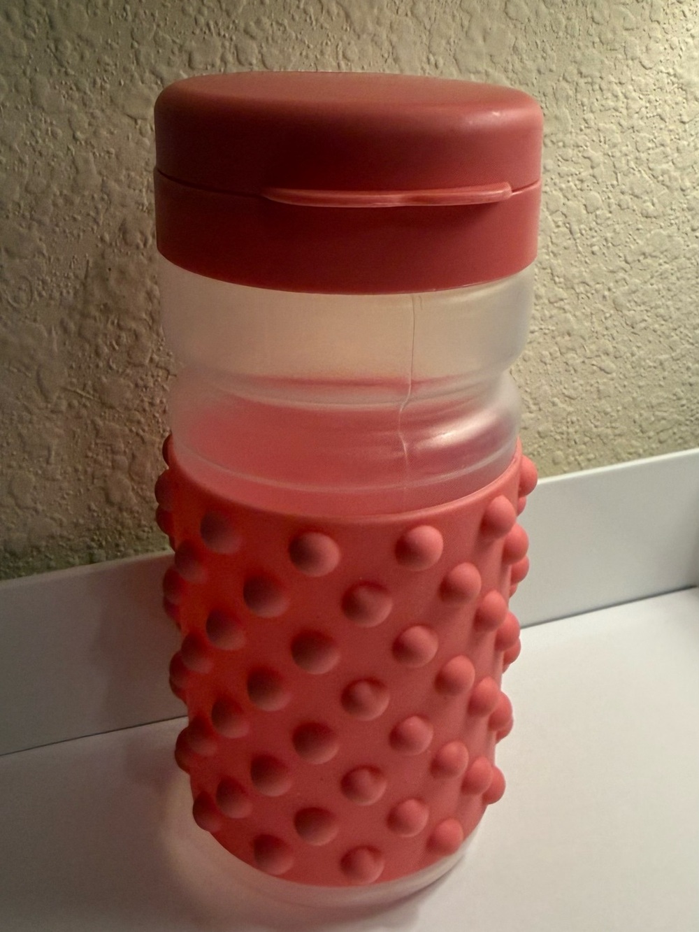 Textured Grip Water Bottle in Coral Pink